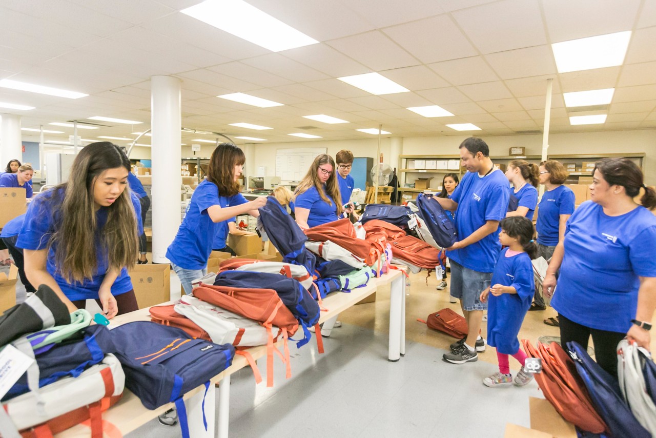 City National Bank colleagues, along with members of their families, helped pack and sort over 1,800 backpacks filled with school supplies that are being delivered to at-risk students at nearly 50 schools and nonprofit groups in eight states.