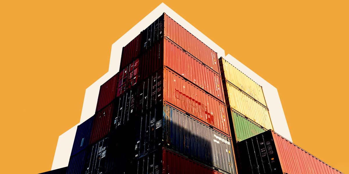 Shipping containers stacked over an orange background