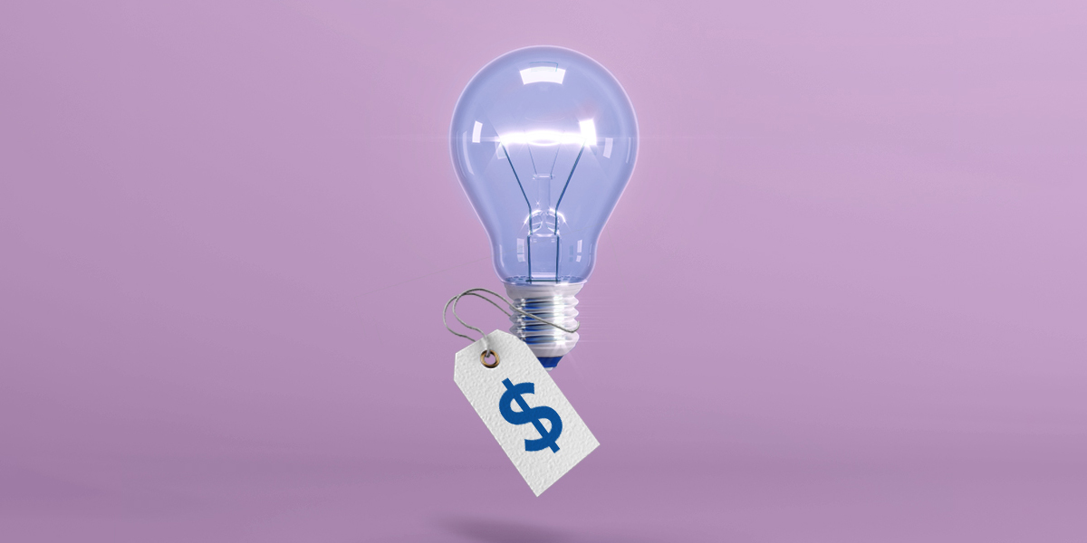 Light bulb with price tag attached to it