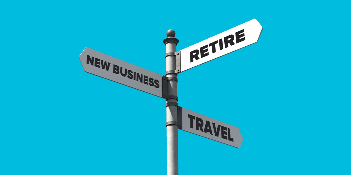 Signpost pointing in directions Retire, New Business and Travel