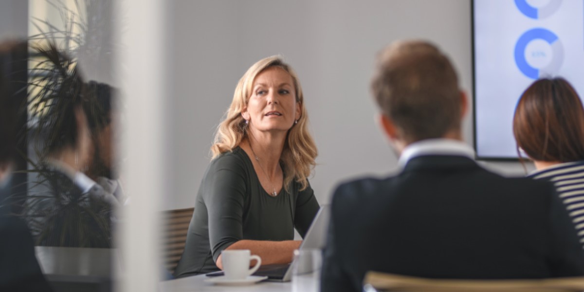 People meeting at table in office