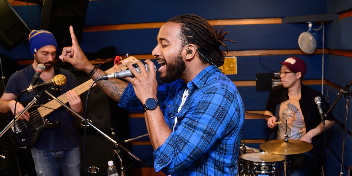 A band practicing in a studio ahead of a live gig.