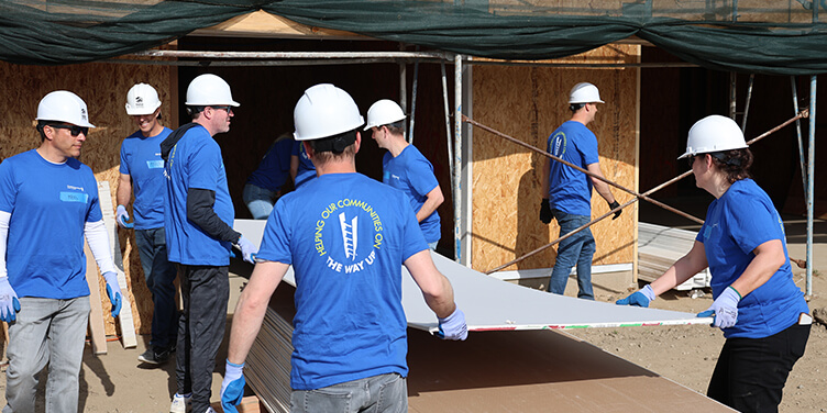 City National Bank colleagues volunteer to build a house