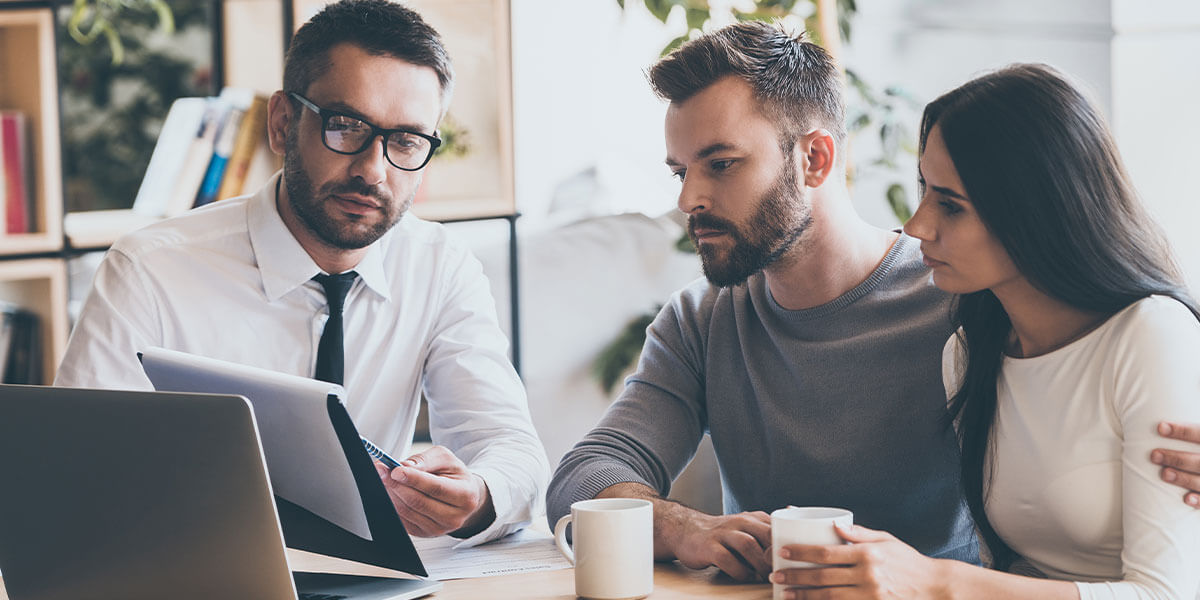 Two people reviewing documents