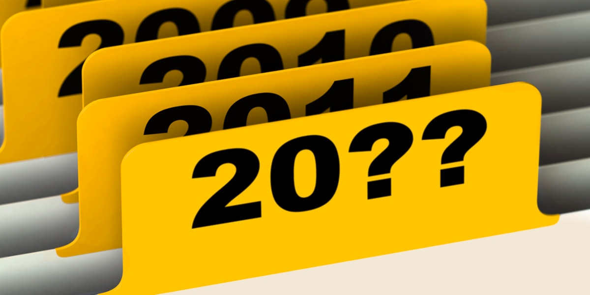 filing tabs with years on them