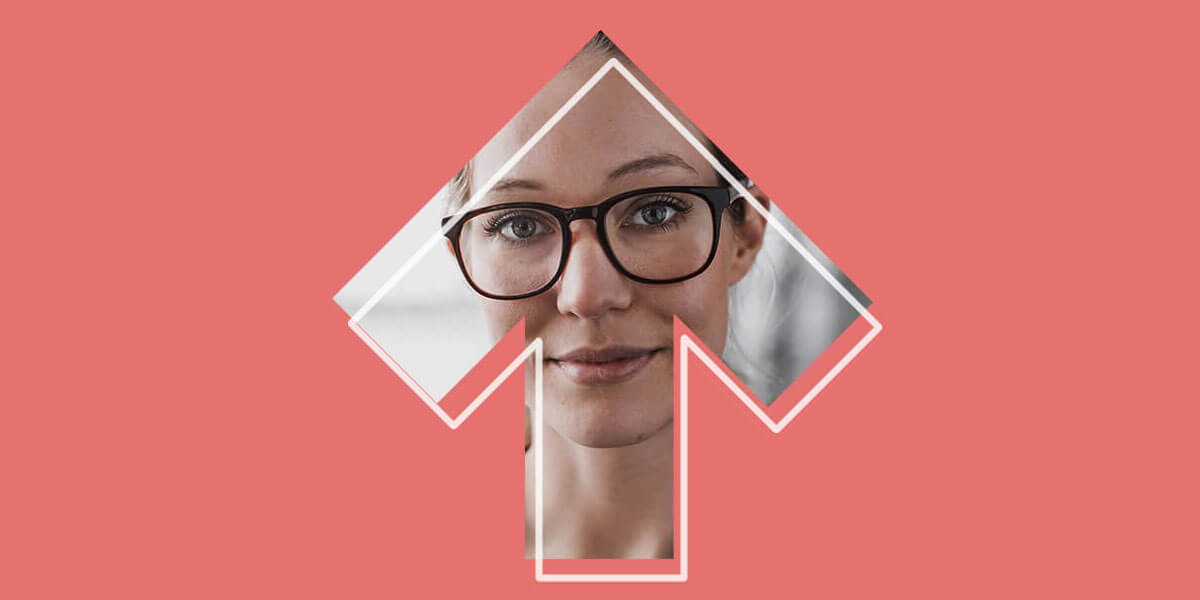 Woman's portrait inside of upward pointing arrow