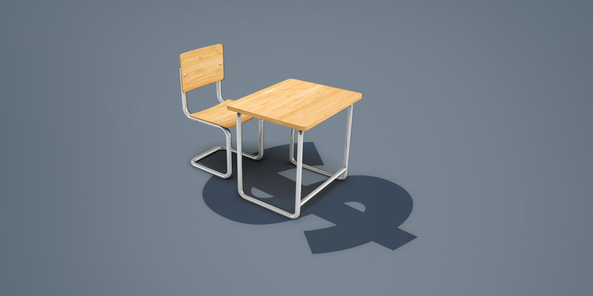 Children school desk with dollar sign shadow