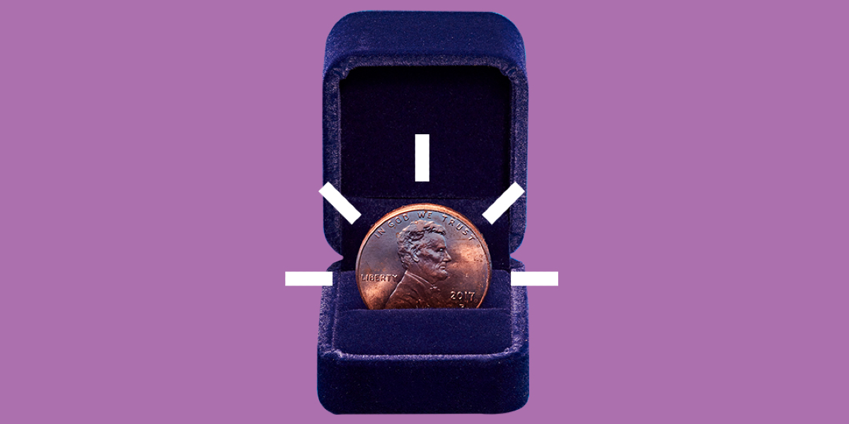 Penny in a ring box