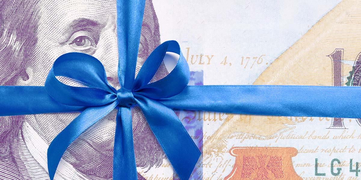 $100 dollar bill wrapped in blue bow