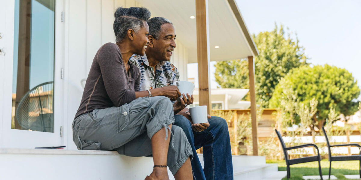 homeowners sitting on porch