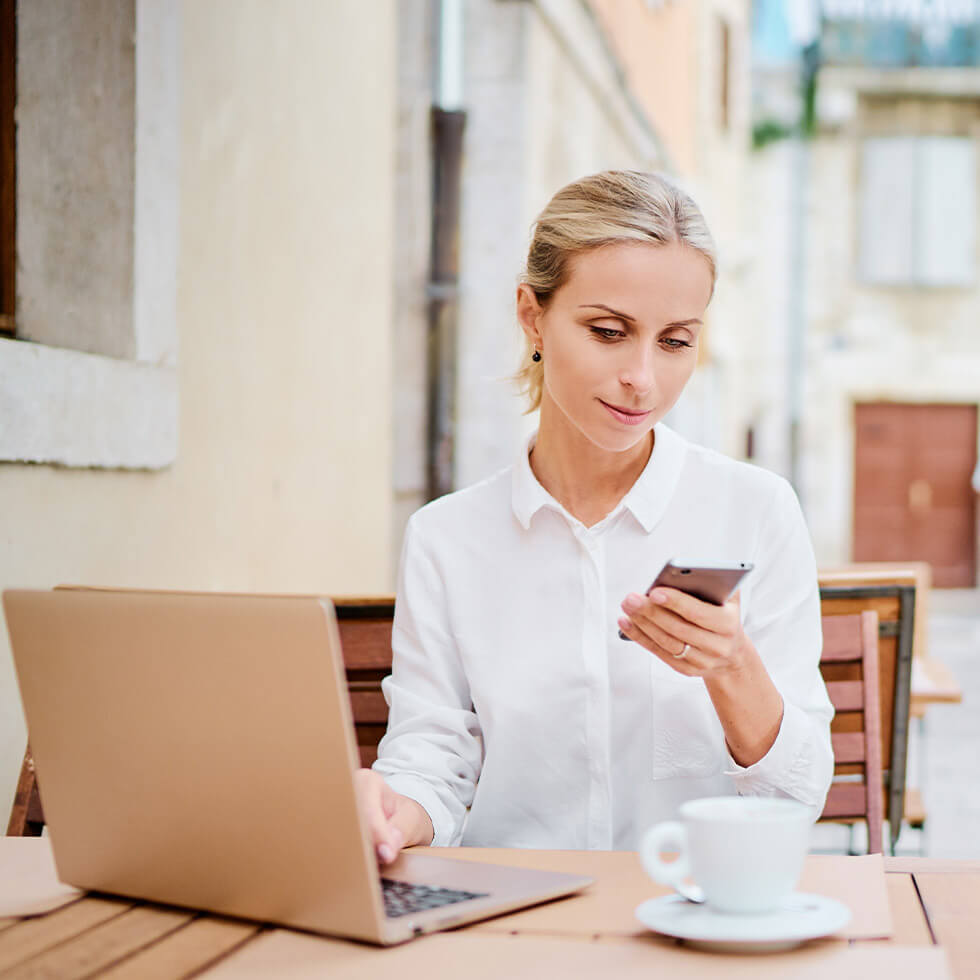 Woman conducting an international wire transfer through City National Bank