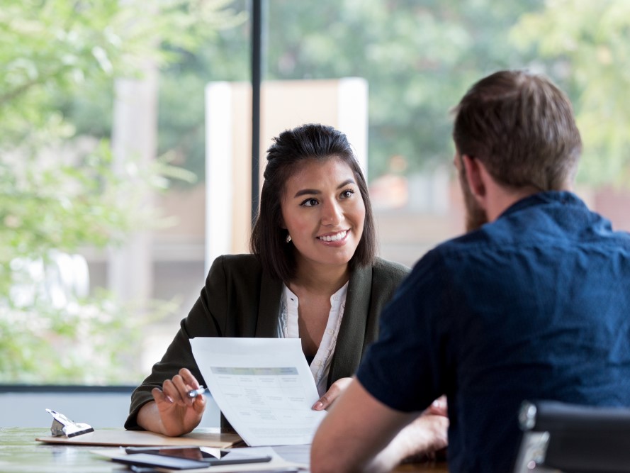 A mortgage banker consulting their client