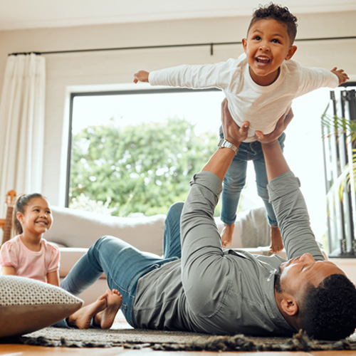 Family playing together in home