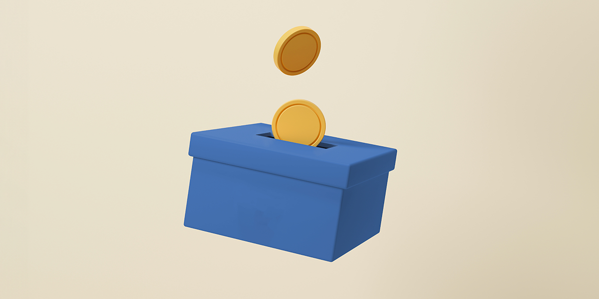 Coins dropping into box